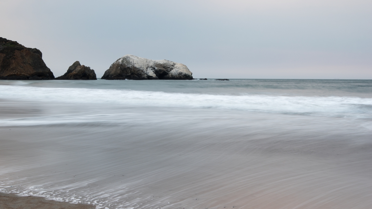 林岬角的海边日落3840x2160风景壁纸