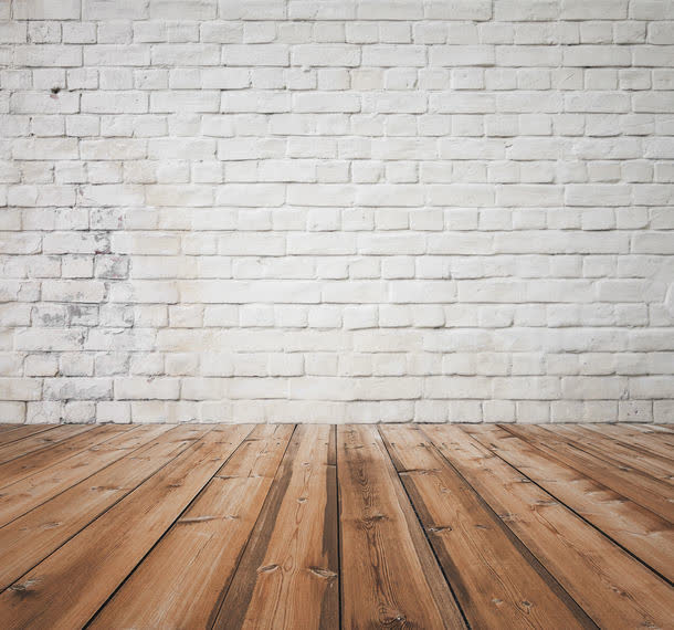 白色砖墙和木质地板背景