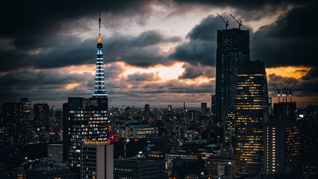 建筑璀璨黄昏，灯光映云间——城市4K高清壁纸，3840x2160免费下载