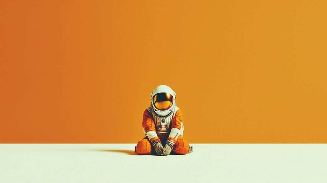 宇航员橙色宇航服头盔4K高清壁纸，3840x2160分辨率，精美背景图片下载