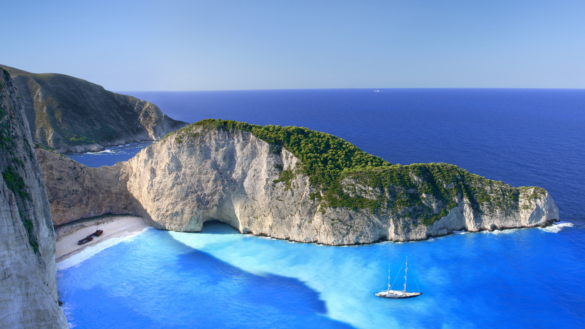 希腊海岛绝美风光，悬崖海滩桌面壁纸，免费下载